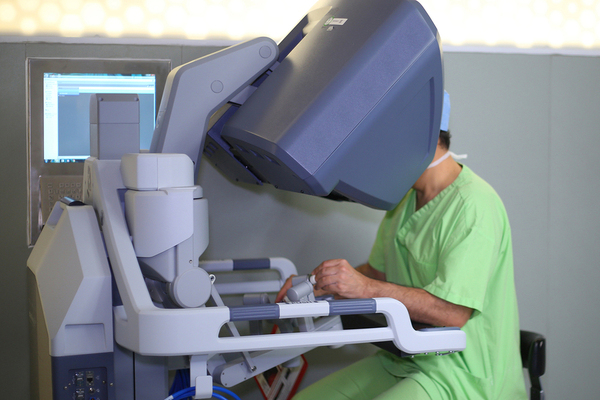 Medical doctor using advanced technology.